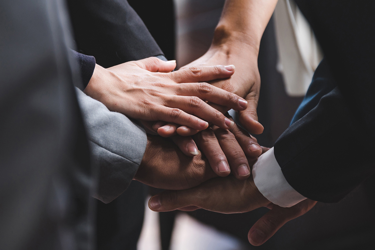 Two business people high-fiving